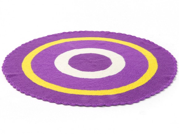 Round Smallstuff carpet in purple and yellow